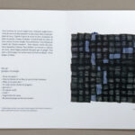 Open book spread with French text on the left page and a dark woven textile artwork on the right page.